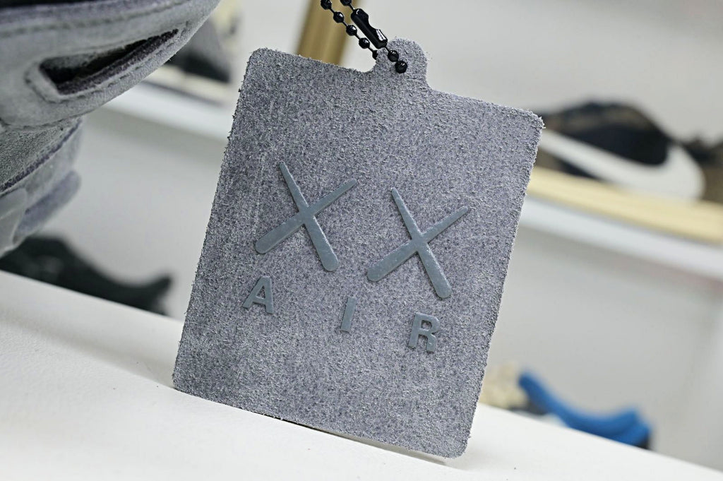 Kaws X Air Jordan 4 Retro Grey 2017